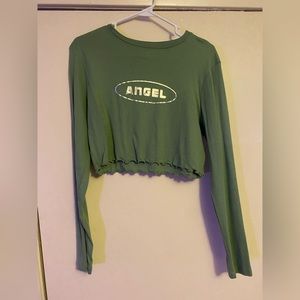 Cropped long sleeve lettuce hem top